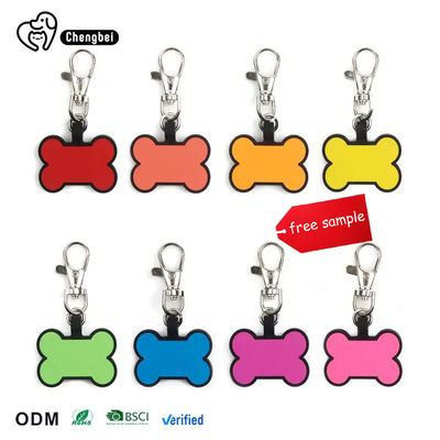 ซื้อ สีชมพู ส้ม สีขาว แท็กที่ระบุตัวสุนัข สีซิลิโคน แท็กชื่อสําหรับสุนัข การผลิตออนไลน์